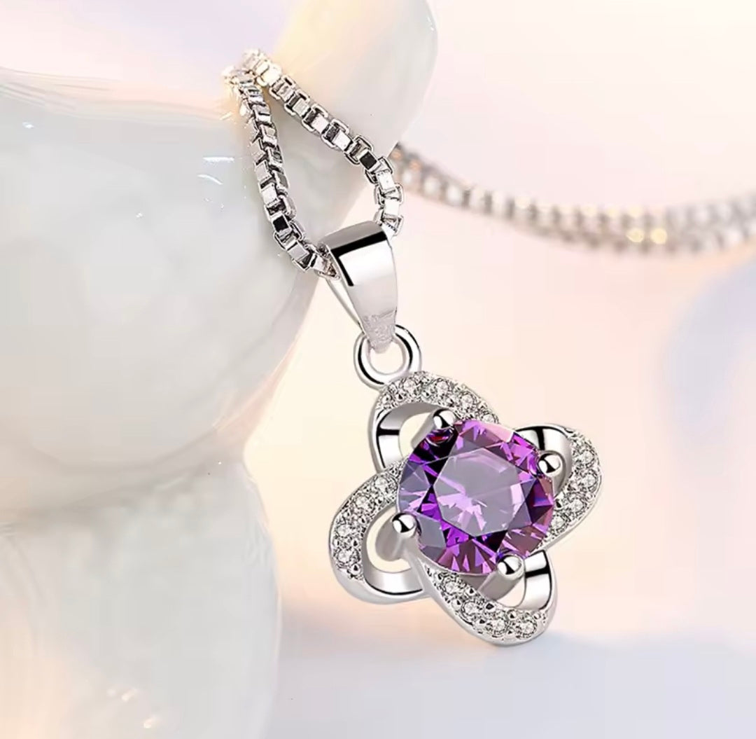 Purple flower pendant necklace