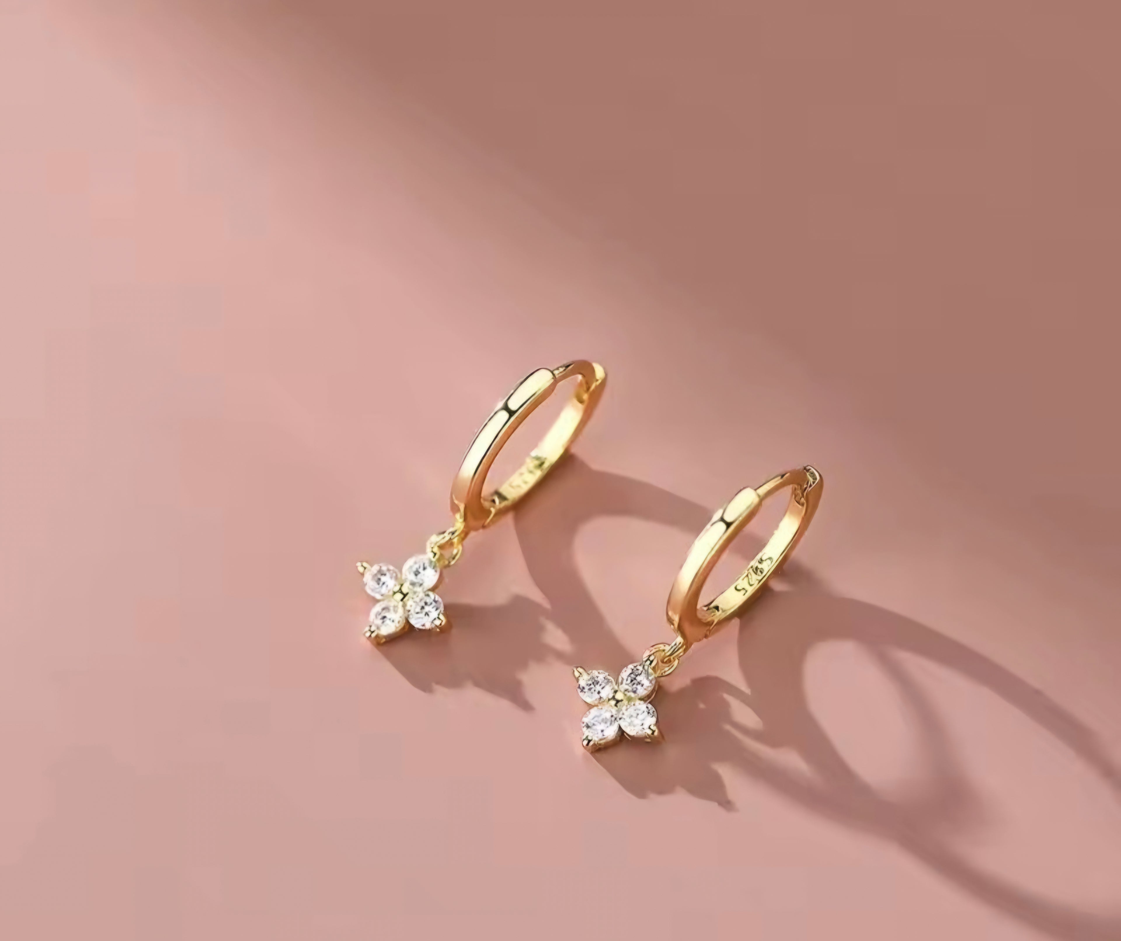 Gold leaf huggie earrings